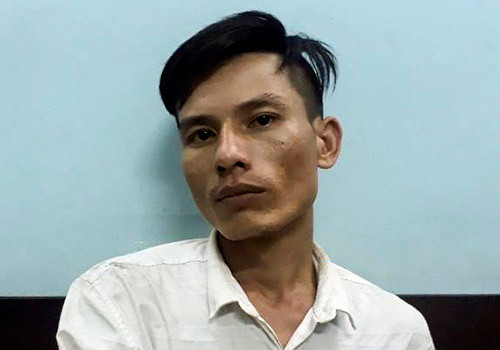 Nghi phạm Dũng tại cơ quan công an. Ảnh: Nam Hà.