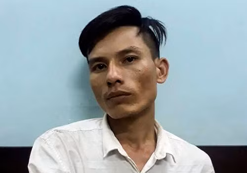 Nghi phạm Dũng tại cơ quan công an. Ảnh: Nam Hà.