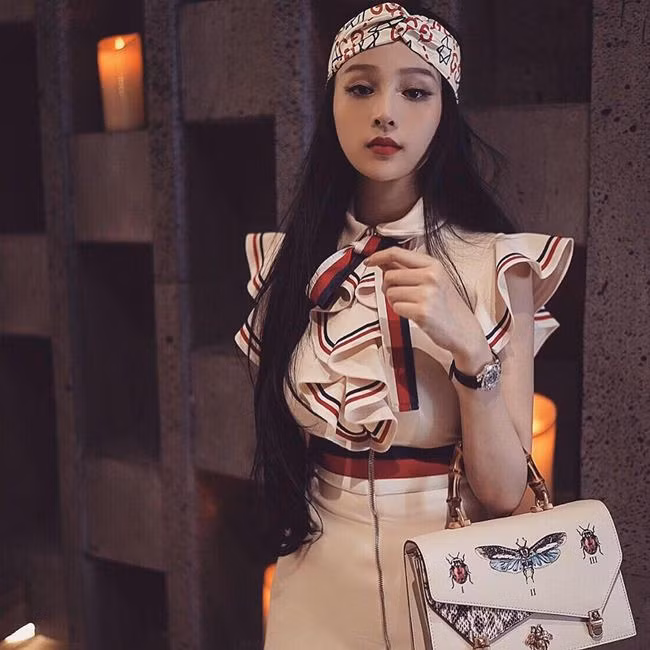 huyen baby noi gi khi bi che "chi xinh thoi, an bam chong, do hieu chat dong" hinh anh 2