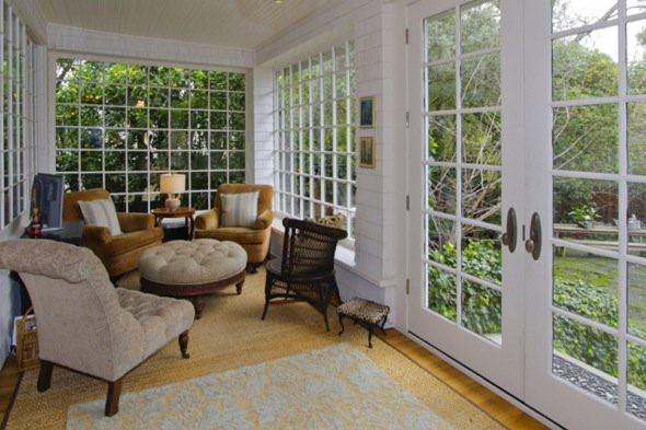 Inside, the house has tons of windows for sunlight ...