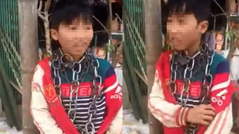 Bức xúc, clip bé trai bị người nhà quấn nhiều vòng xích quanh cổ