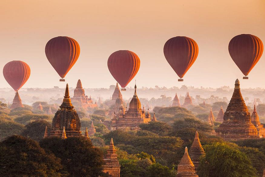 Bagan, Myanmar (9-10 triệu/4 ngày, 3 đêm): Không chỉ nổi tiếng là vùng đất của những công trình đền chùa độc đáo nhất Đông Nam Á, Bagan còn mang một màu sắc huyền bí, linh thiêng với vô số những bất ngờ thú vị đang đợi bạn khám phá. Dù bình minh hay hoàng hôn, “thiên đường của mặt trời” luôn khiến du khách trầm trồ bởi vẻ đẹp huyền ảo khó nơi nào sánh bằng. Không cần đến Thổ Nhĩ Kỳ, bạn cũng có cơ hội tận mắt chứng kiến cảnh đẹp tựa chốn tiên cảnh khi hàng trăm chiếc khinh khí cầu bay giữa ánh nắng vàng. Nếu chịu chi một chút, 400 USD là số tiền đủ để bạn có một trải nghiệm tuyệt vời khi bay lơ lửng trên bầu trời cùng khinh khí cầu. Ảnh: GoinGo. Chi 10 trieu dong, tu tin du lich nhung diem den nuoc ngoai duoi day hinh anh 6