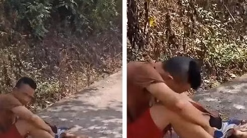 Bất chấp vết thương gây đau đớn, anh Huang vẫn cố đứng dậy để đi nhặt phần cánh tay đứt lìa trước khi quay trở lại chỗ lề đường gần nơi gặp nạn để ngồi chờ người đến cứu.