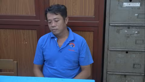 Đổng Huy Hoàng bị bắt giữ. (Ảnh: C.A.)