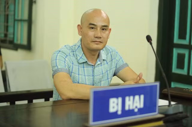  Anh Nguyễn Văn Thiện tại tòa sáng nay. Ảnh: Lao động 