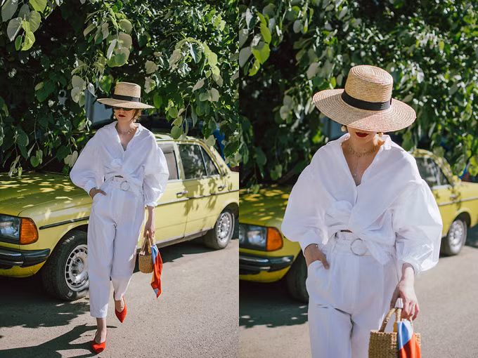 Thay vì các kiểu sơ mi "mực thước" khi đến văn phòng là kiểu áo biến tấu độc đáo để bạn gái lên đồ street style cuối tuần. Giầy đỏ tươi cùng màu son rực rỡ sẽ tạo điểm nhấn bắt mắt cho set đồ thuần sắc trắng. Xuống phố cuố tuần với những set đồ trẻ trung