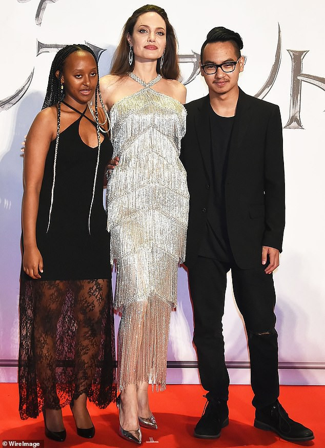 angelina jolie dep hut mat, vui ve hoi ngo con trai maddox o nhat ban hinh 2