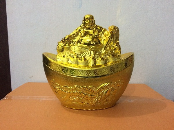 Tại cung Tây Bắc đặt các tượng đồng có thật nhiều đồng tiền hoặc thỏi vàng kích hoạt cực mạnh tài lộc cho phòng khách. Cách sắp xếp các vật phẩm phong thủy đón lộc về nhà trong ngày Tết