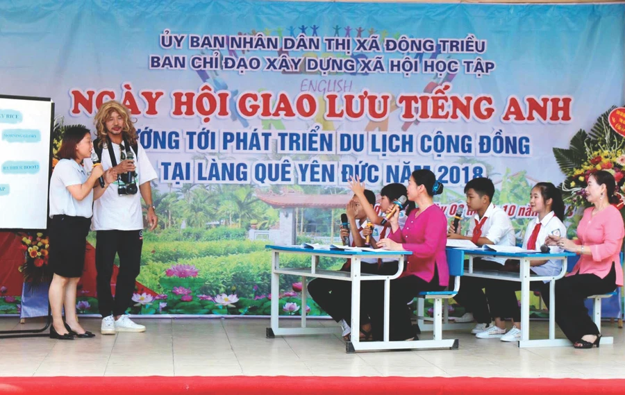 Một hoạt cảnh lớp họcTiếng Anh cộng đồng. Ảnh: TG