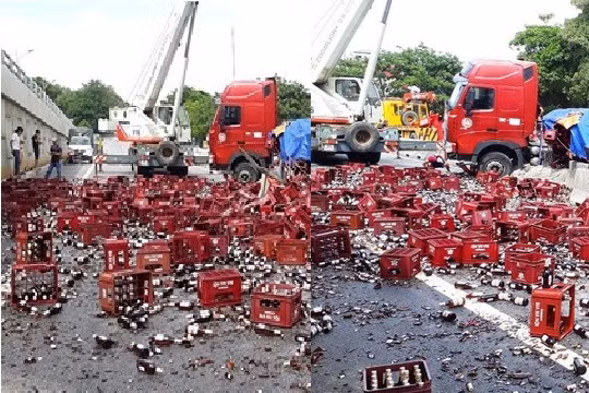 Thanh Hóa: Xe đầu kéo chở bia nổ lốp, hàng trăm két bia vỡ tung tóe trên quốc lộ