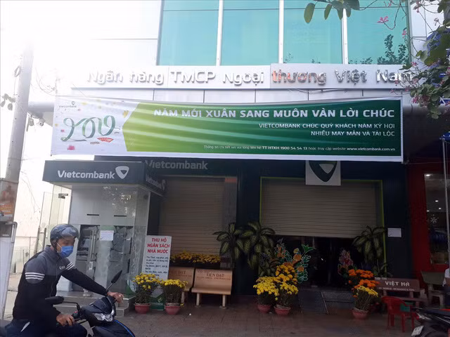 Ngân hàng nghỉ Tết, ATM cũng…nghỉ theo - Ảnh 1.