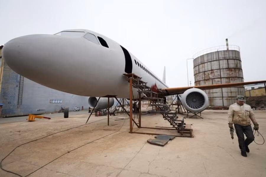 nong dan trung quoc tu che may bay tau ngam