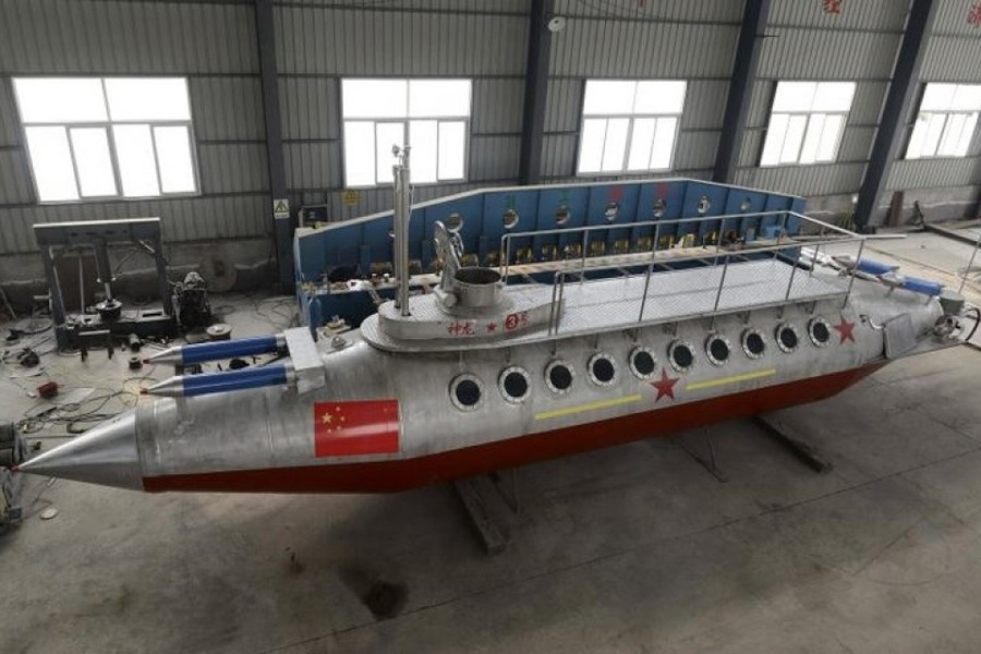 Nông dân Trung Quốc tự chế máy bay, tàu ngầm nong dan trung quoc tu che may bay tau ngam