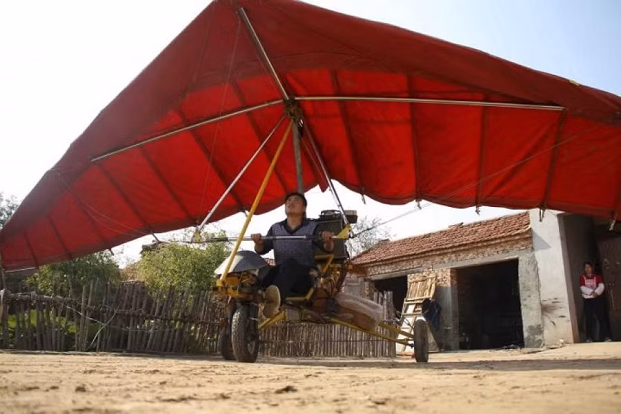 nong dan trung quoc tu che may bay tau ngam