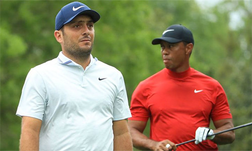 Molinari (trái) có lúc khiến Woods lo lắng, nhưng golfer Italy không duy trì được phong độ ở nửa sau vòng
