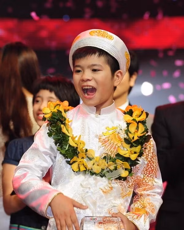 Quán quân "Giọng hát Việt nhí 2013" Quang Anh.