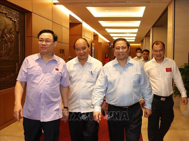 Chủ tịch nước Nguyễn Xuân Phúc, Thủ tướng Phạm Minh Chính, Chủ tịch Quốc hội Vương Đình Huệ đến dự hội nghị. Ảnh: Trí Dũng/TTXVN Chủ tịch nước Nguyễn Xuân Phúc, Thủ tướng Phạm Minh Chính, Chủ tịch Quốc hội Vương Đình Huệ đến dự hội nghị. Ảnh: Trí Dũng/TTXVN