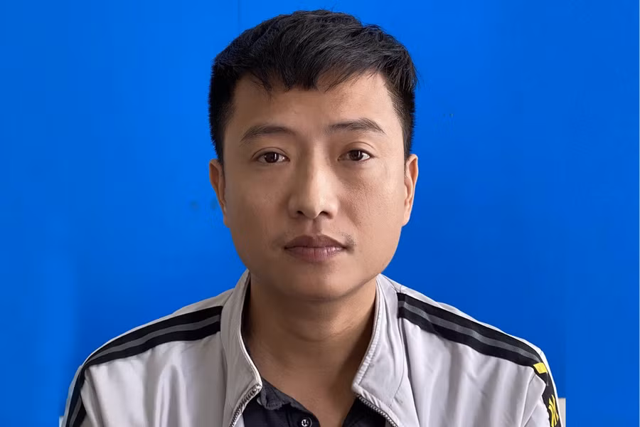 Phạm Trọng Phương tại cơ quan công an. (Ảnh: CANA)