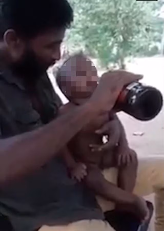 Dân mạng đùng đùng nổi giận với người cha cho con trai một tuổi uống bia - 1