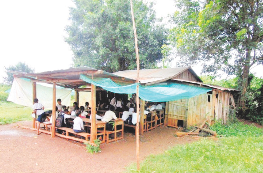 Trường Tiểu học Phum Kandal cũ vốn chỉ là một căn lán gỗ trống trải và ọp ẹp (Ảnh được cung cấp bởi Hiệp hội Tình nguyện Shanti)