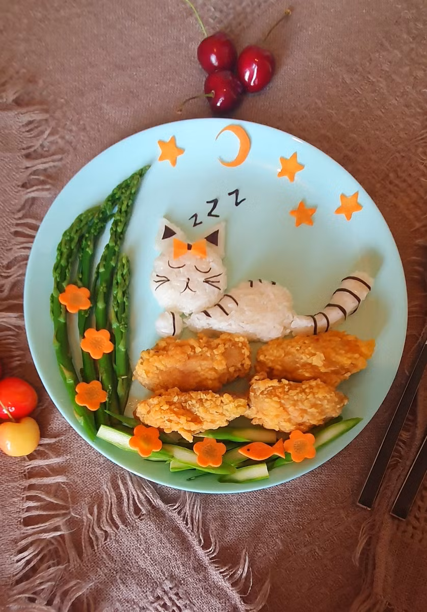 Măng tây, cà rốt hấp. Cánh gà rán.