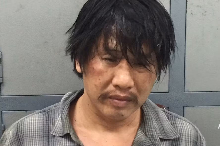 Đối tượng Khánh "kê" sau khi bị bắt. Ảnh:P.L
