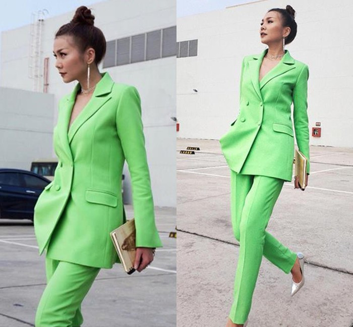 Thanh Hằng chứng minh đẳng cấp thời trang sánh ngang các fashionista quốc tế khi thử nghiệm bộ suit màu xanh neon chói mắt theo phong cách menswear.