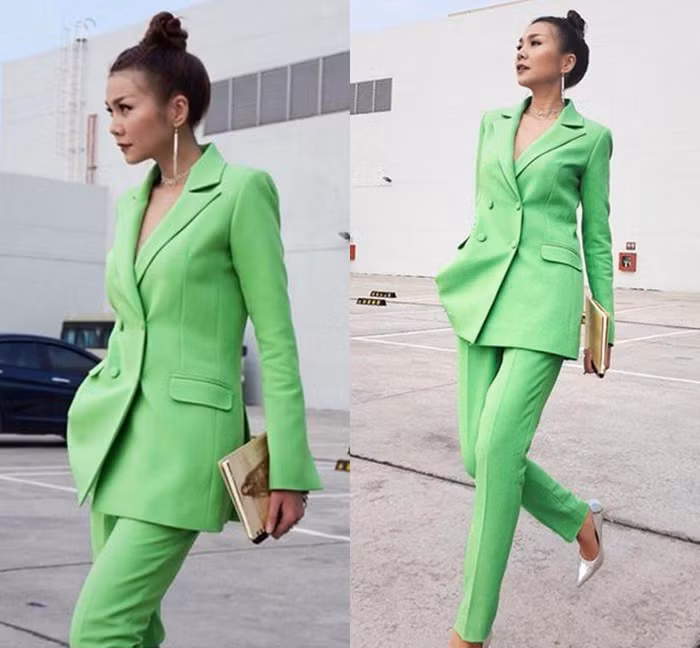 Thanh Hằng chứng minh đẳng cấp thời trang sánh ngang các fashionista quốc tế khi thử nghiệm bộ suit màu xanh neon chói mắt theo phong cách menswear.