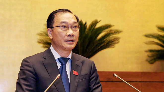 Chủ nhiệm Ủy ban Kinh tế Vũ Hồng Thanh thay mặt đoàn giám sát trình bày báo cáo trước Quốc hội /// Ảnh Ngọc Thắng
