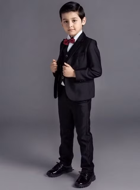 Cha mẹ có thể giúp con nuôi dưỡng những phẩm chất để trở thành quý ông lịch lãm (hình minh họa).