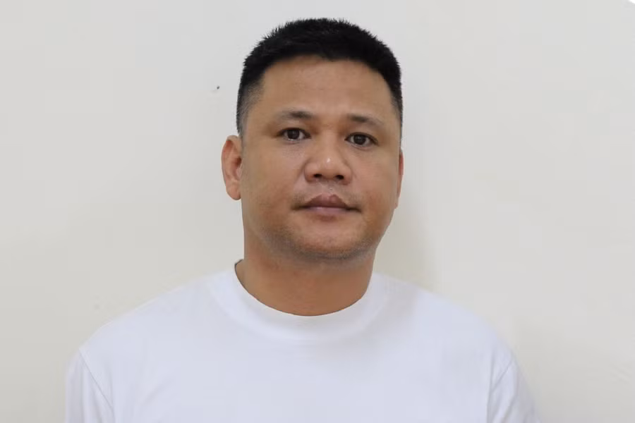 Trịnh Công Chính tại cơ quan điều tra. Ảnh: CANA