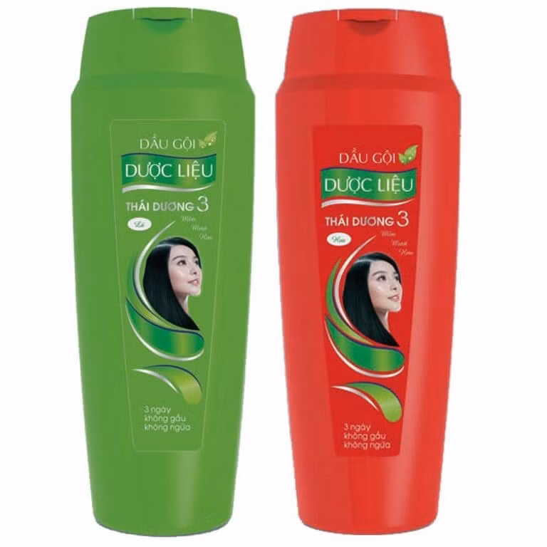 Bộ sản phẩm dầu gội mọc tóc Thái Dương 3 với hai màu xanh – đỏ.