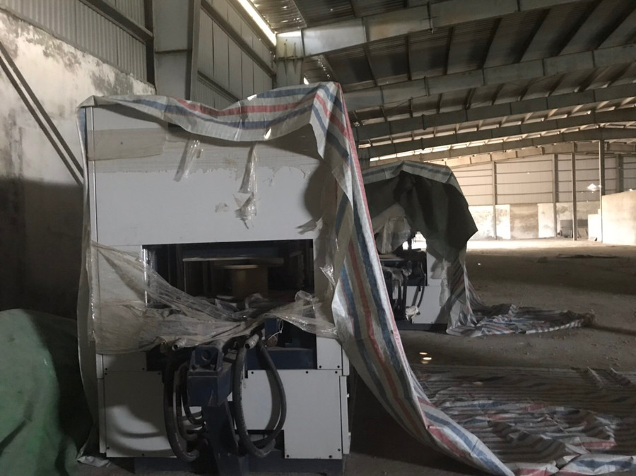 Máy móc tại nhà máy sản xuất bao bì của Cty Toàn Thắng nằm "đắp chiếu".