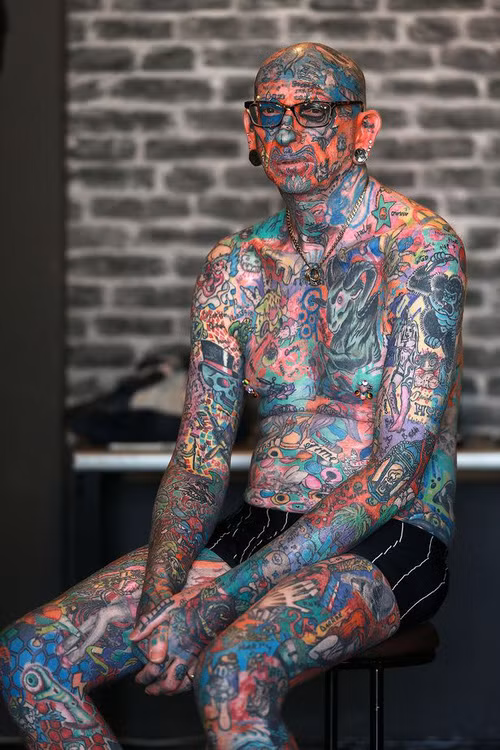 Người đàn ông chi gần 450 triệu để xăm 810 hình xăm lên cơ thể mình - Ảnh 6.