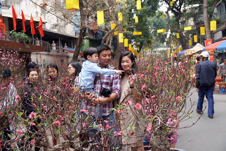 Hương vị Tết xưa ở chợ hoa nổi tiếng Hà Thành ảnh 16 Hương vị Tết xưa ở chợ hoa nổi tiếng Hà Thành ảnh 16