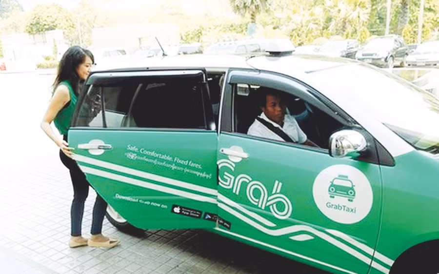 Hành khách thích trải nghiệm với Grab taxi (Ảnh mang tính minh họa)
