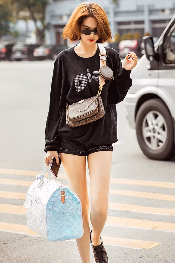 Đâu cần bikini, với style toàn hàng hiệu này - Ngọc Trinh cũng khiến dân tình bấn loạn - Hình 6