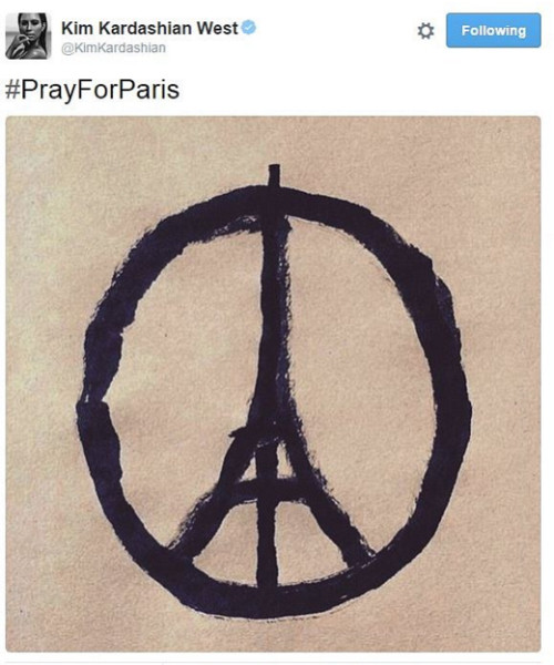 Kim Kardashian chia sẻ hình vẽ kèm hashtag # "Prayforparis"... nguon-goc-cua-hinh-ve-peace-for-paris-lan-truyen-khap-the-gioi-2