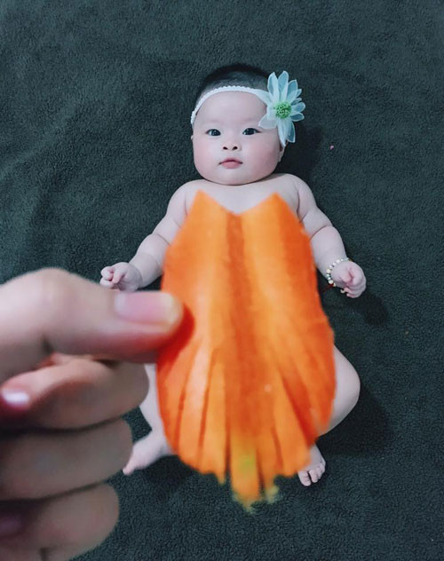 Chị Sáng nảy ra ý tưởng chụp bộ ảnh thời trang cho con, từ chính những chất liệu sẵn có trong vườn nhà. Chị Sáng nảy ra ý tưởng chụp bộ ảnh thời trang cho con, từ chính những chất liệu sẵn có trong vườn nhà.