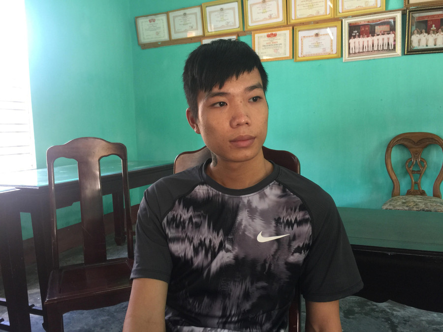 Trần Quang Tú tại cơ quan công an