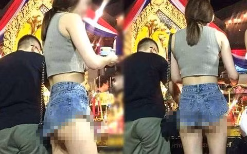 Đi lễ chùa đầu năm, cô gái gây bức xúc với cách ăn mặc xuyên thấu, thiếu vải - Ảnh 2.