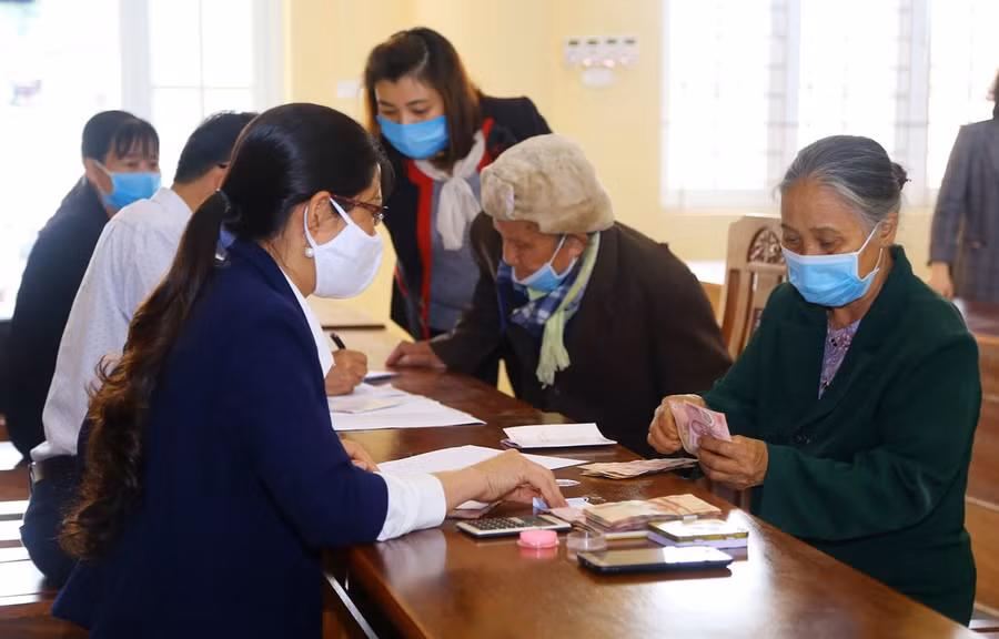 Chỉ trả lương hưu, trợ cấp xã hội cho người dân. (Ảnh minh họa: PV/Vietnam+).