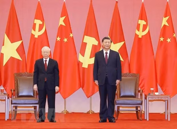 Tổng Bí thư, Chủ tịch Trung Quốc Tập Cận Bình và Tổng Bí thư Nguyễn Phú Trọng dự buổi lễ. (Ảnh: Trí Dũng/TTXVN)