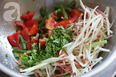 Gỏi đu đủ mực rim chua giòn giải ngán cho bữa tiệc ảnh 13 Gỏi đu đủ mực rim chua giòn giải ngán cho bữa tiệc ảnh 13