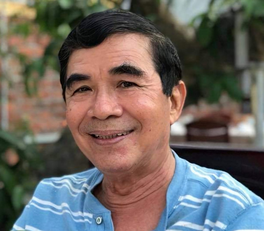 Chân dung tác giả, nhà báo Lưu Đình Triều.