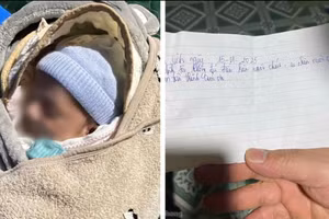 Bé trai khoảng 1 tuần tuổi bị bỏ rơi trong đêm tối cùng lời nhắn của người thân.