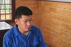 Ông Bạch Biên Hòa, nguyên Phó Chủ tịch UBND xã Hòa Xuân, TP Buôn Ma Thuột tại cơ quan điều tra. (Ảnh: SD)