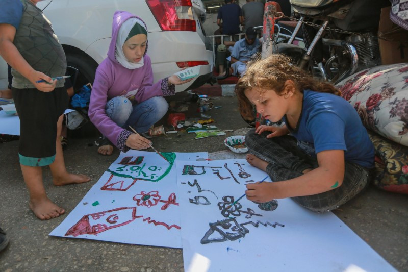 Chùm ảnh khoảnh khắc vui vẻ ngắn ngủi của trẻ em ở Gaza 