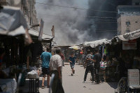 chum-anh-khoanh-khac-mot-cuoc-khong-kich-vao-thanh-pho-gaza-04.jpg