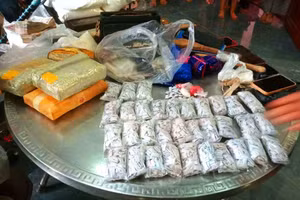 Tang vật ma túy tổng hợp và heroin lực lượng chức năng thu giữ. Ảnh: CACC
